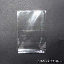Load image into Gallery viewer, 100Pcs Transparent Plastic Bags for Candy Lollipop Cookie Packaging Cellophane Bag Christmas Wedding Birthday Party Gift Bag
